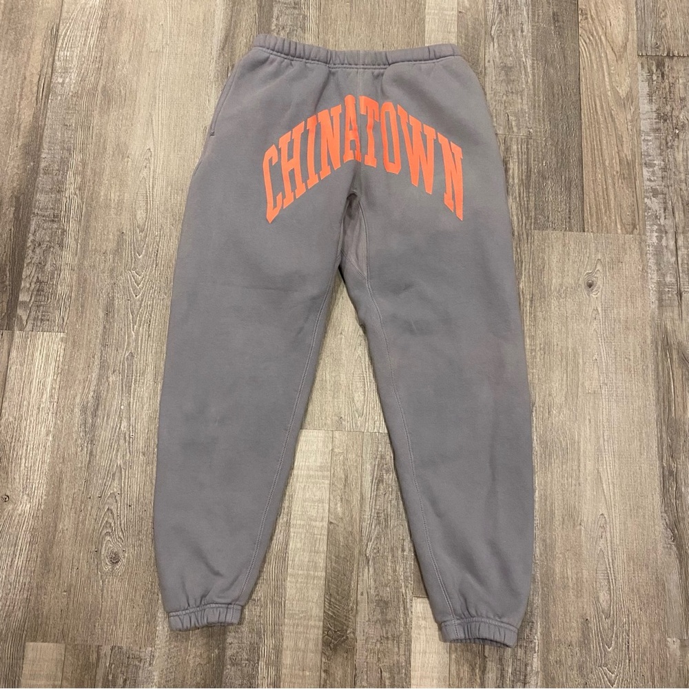 Chinatown Market Gray Sweatpants with pink Logo